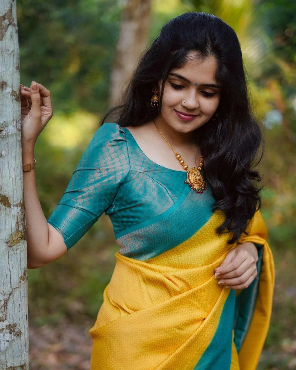 Yellow Silk Saree with Teal Green Border
