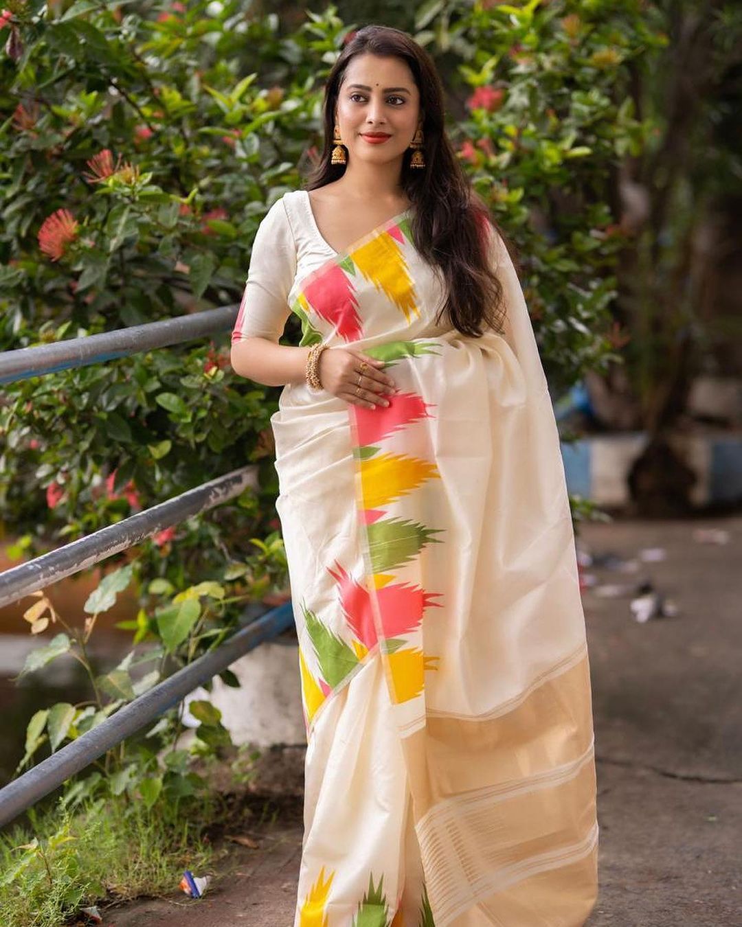 Designer Printed Saree with Contrast Pattern & Woven Border
