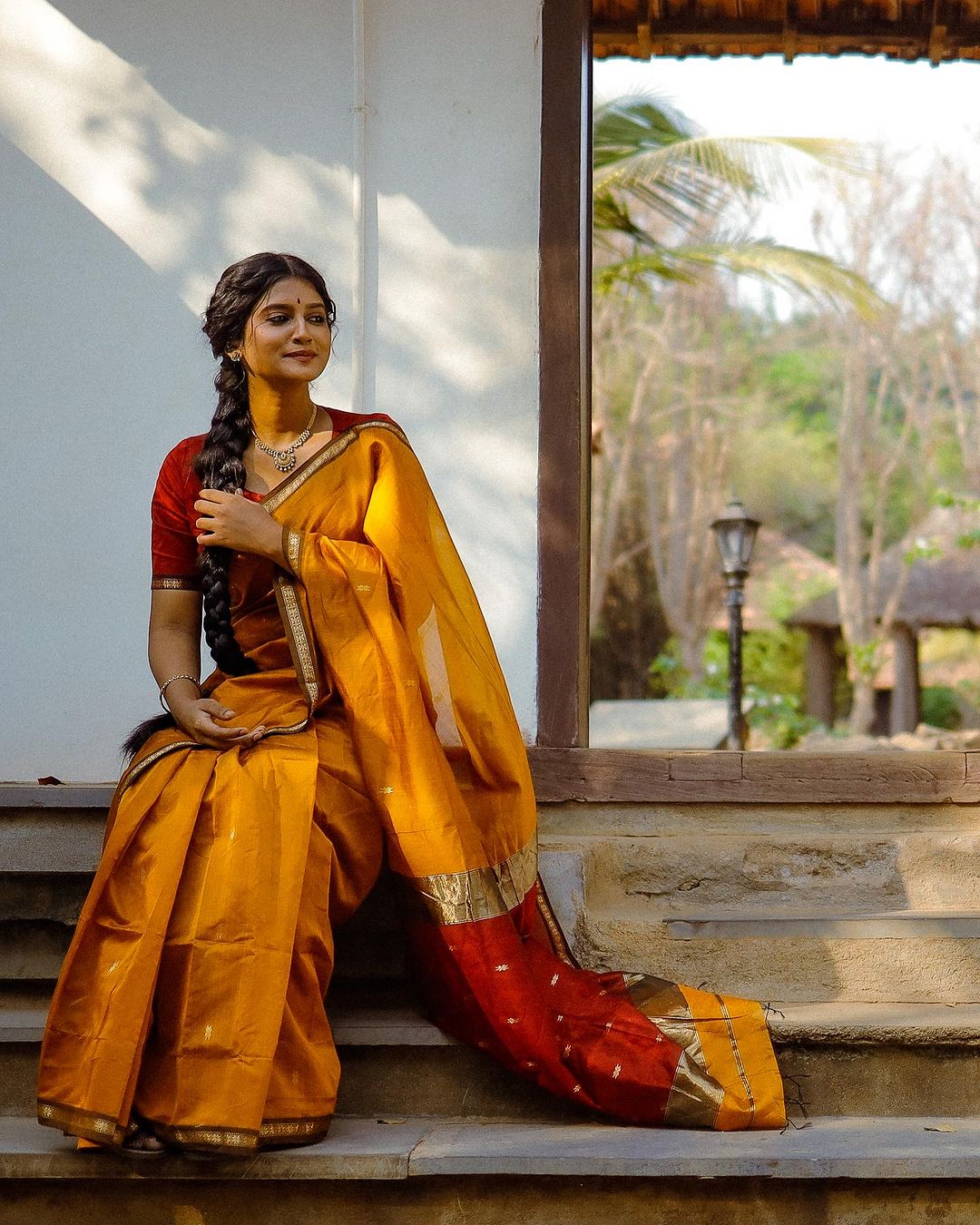 Yellow Silk Saree with Gold Border & Red Blouse