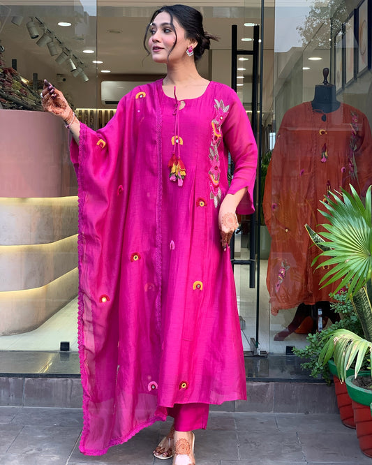 Vibrant Pink Embroidered Kurta Set with Playful Tassel Detailing