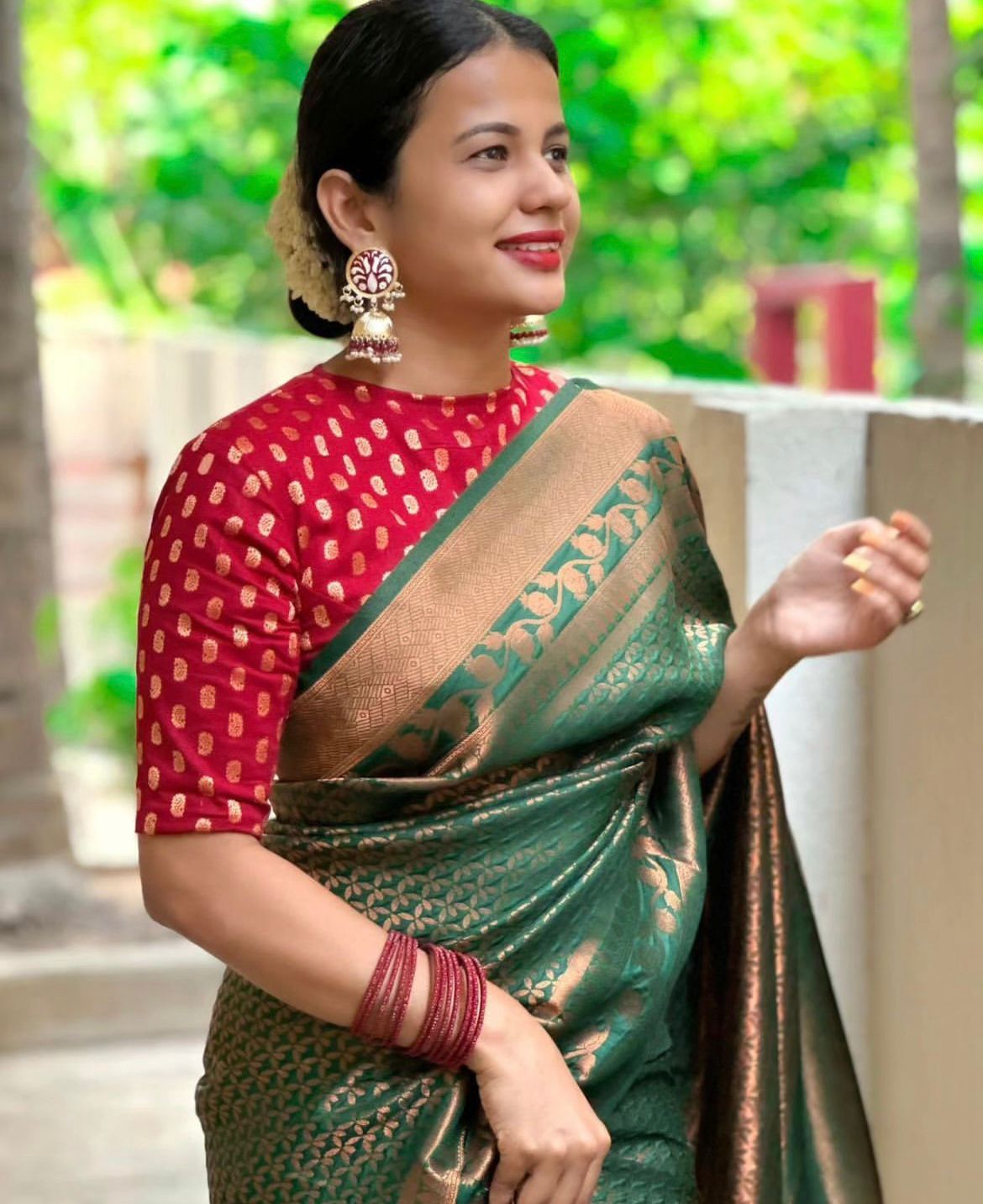 Elegant Green Silk Saree with Zari Work & Red Blouse