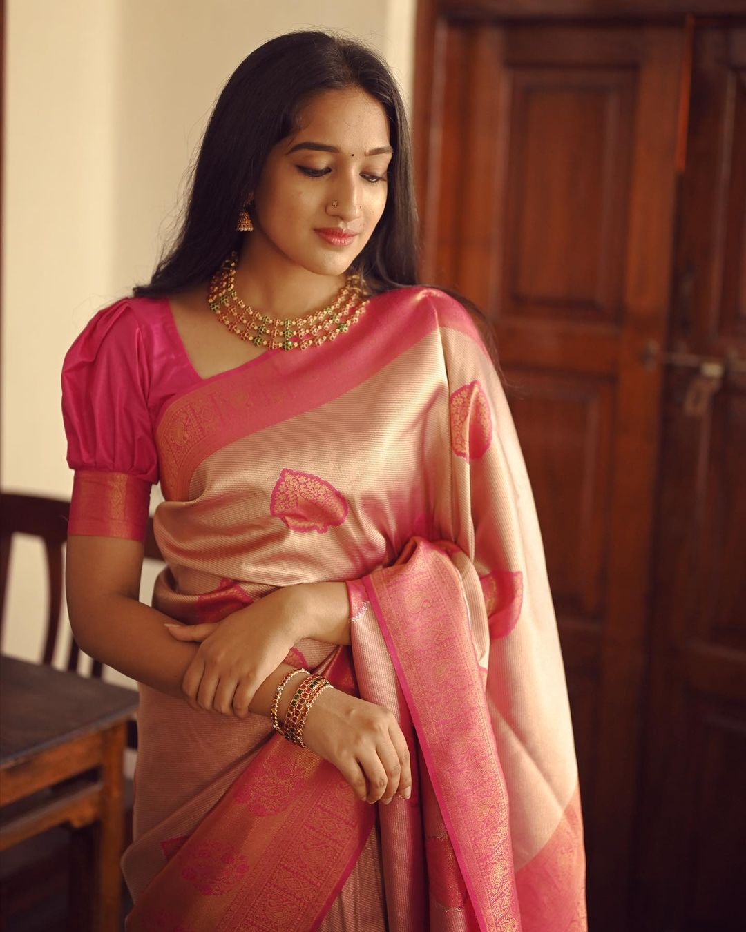 Elegant Pink & Gold Silk Saree with Traditional Motifs