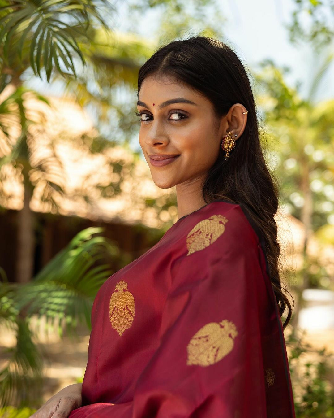 Maroon Elegance with Rich Golden Weave