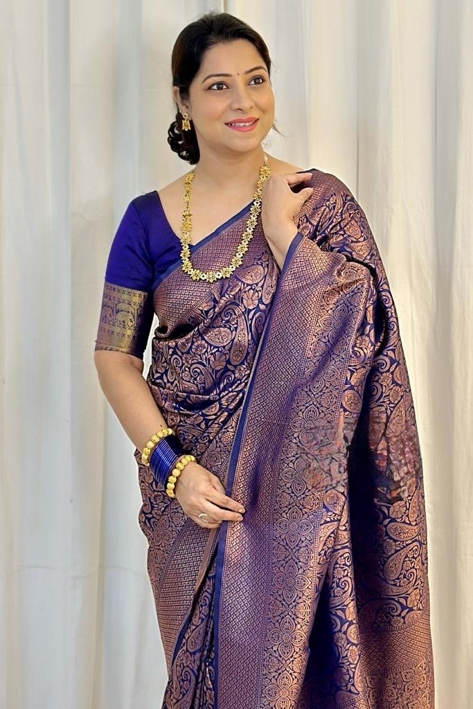 Elegant Woven Silk Saree with Rich Traditional Pattern & Designer Blouse