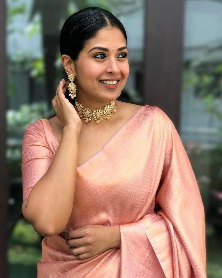 Elegant Peach Silk Saree with Subtle Zari Work & Rich Border