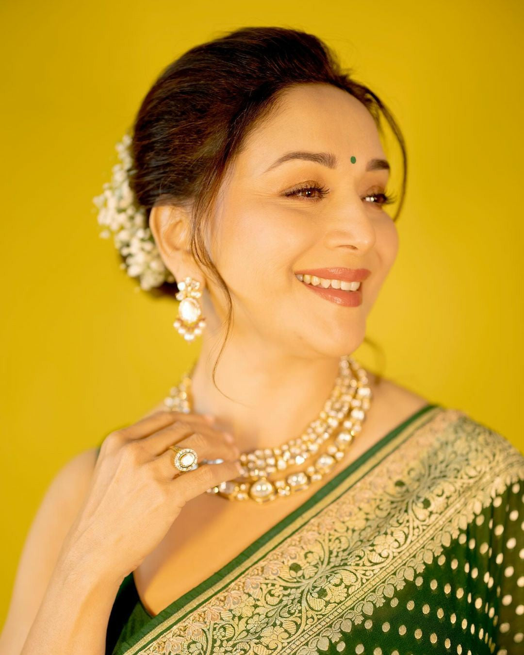 Green Silk Saree with Gold Butti & Zari Border