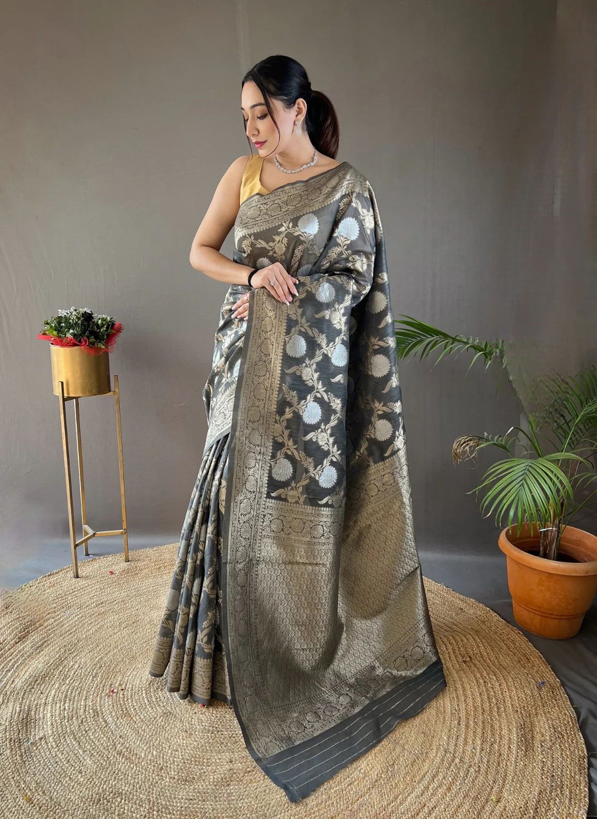 Elegant Silk Saree with Floral Motifs & Rich Zari Border