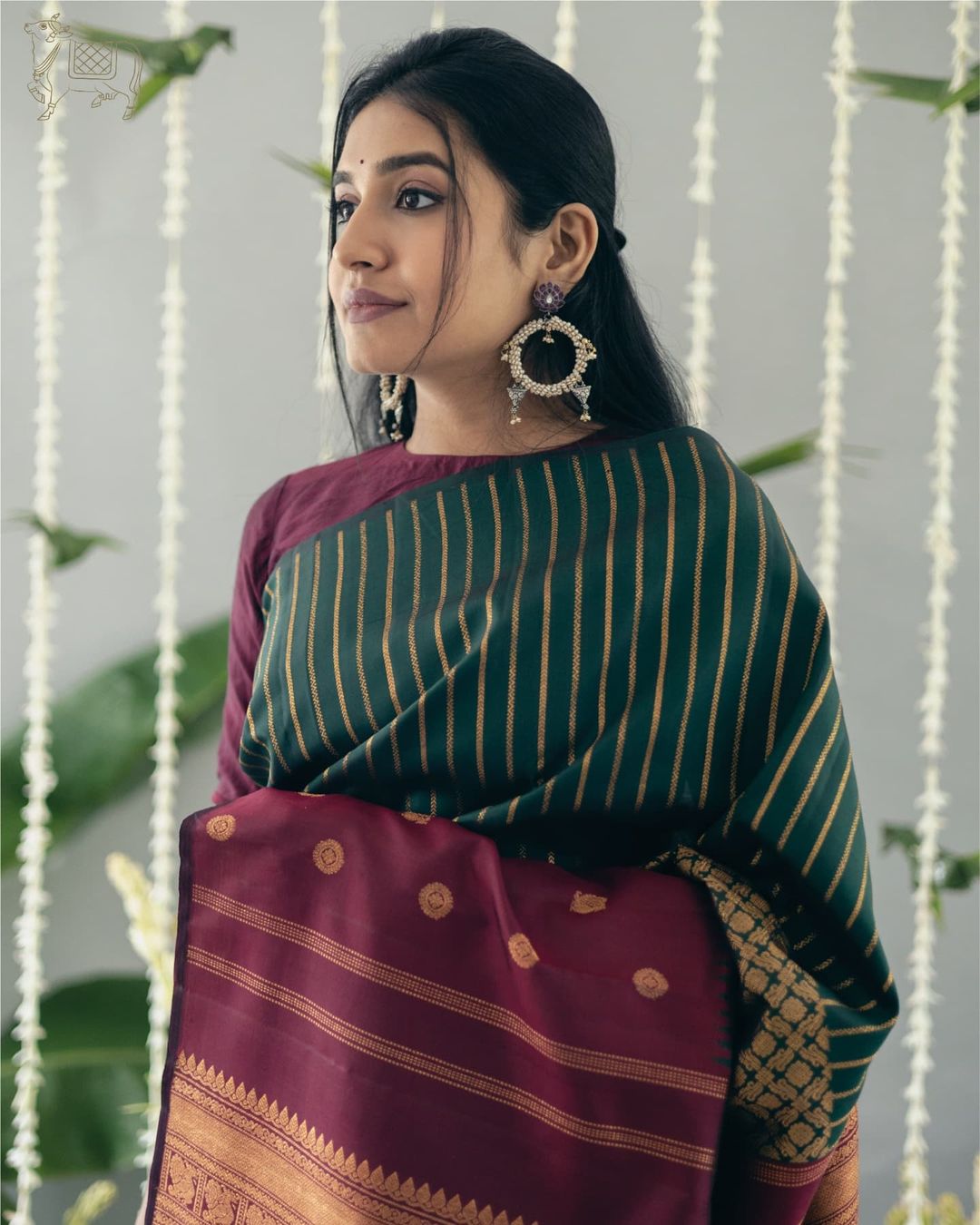 Green Silk Saree with Wine Contrast Border & Gold Zari Weaving