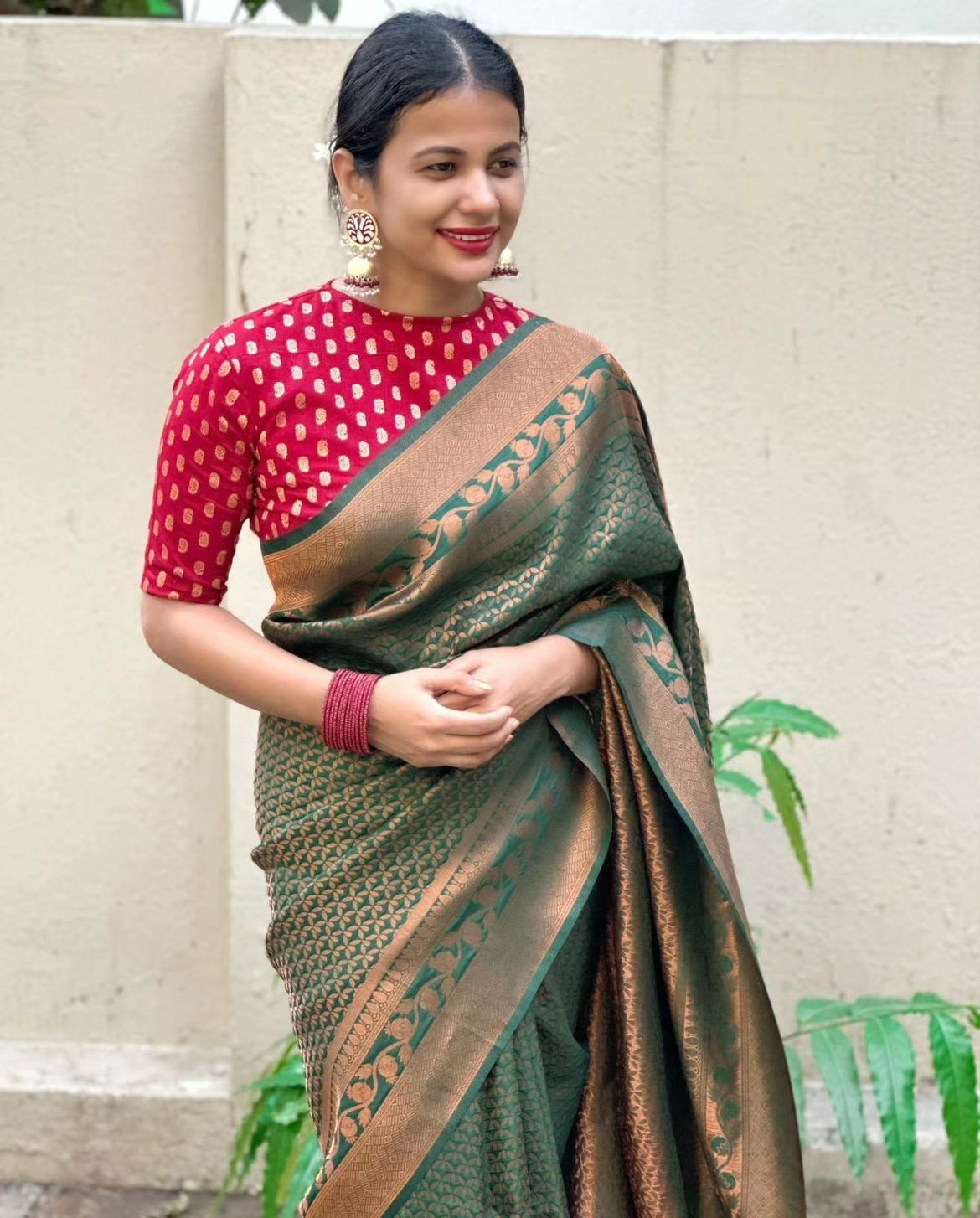 Elegant Green Silk Saree with Zari Work & Red Blouse