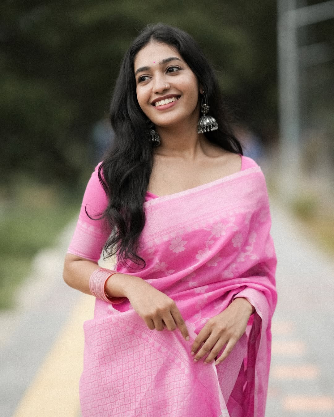 Soft Pink Linen Saree with Floral Weaving