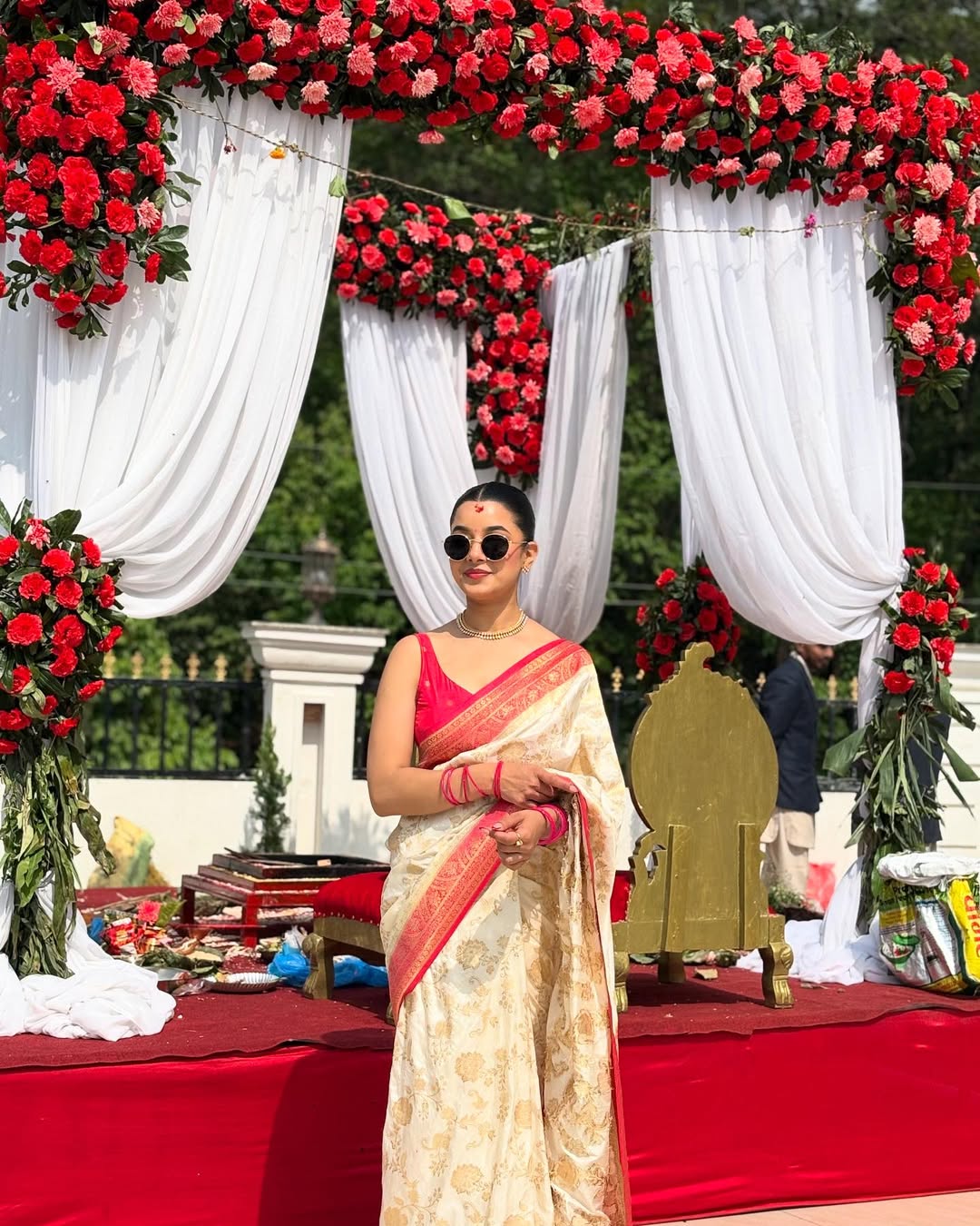 Elegant White Silk Saree with Gold Motifs & Red Border