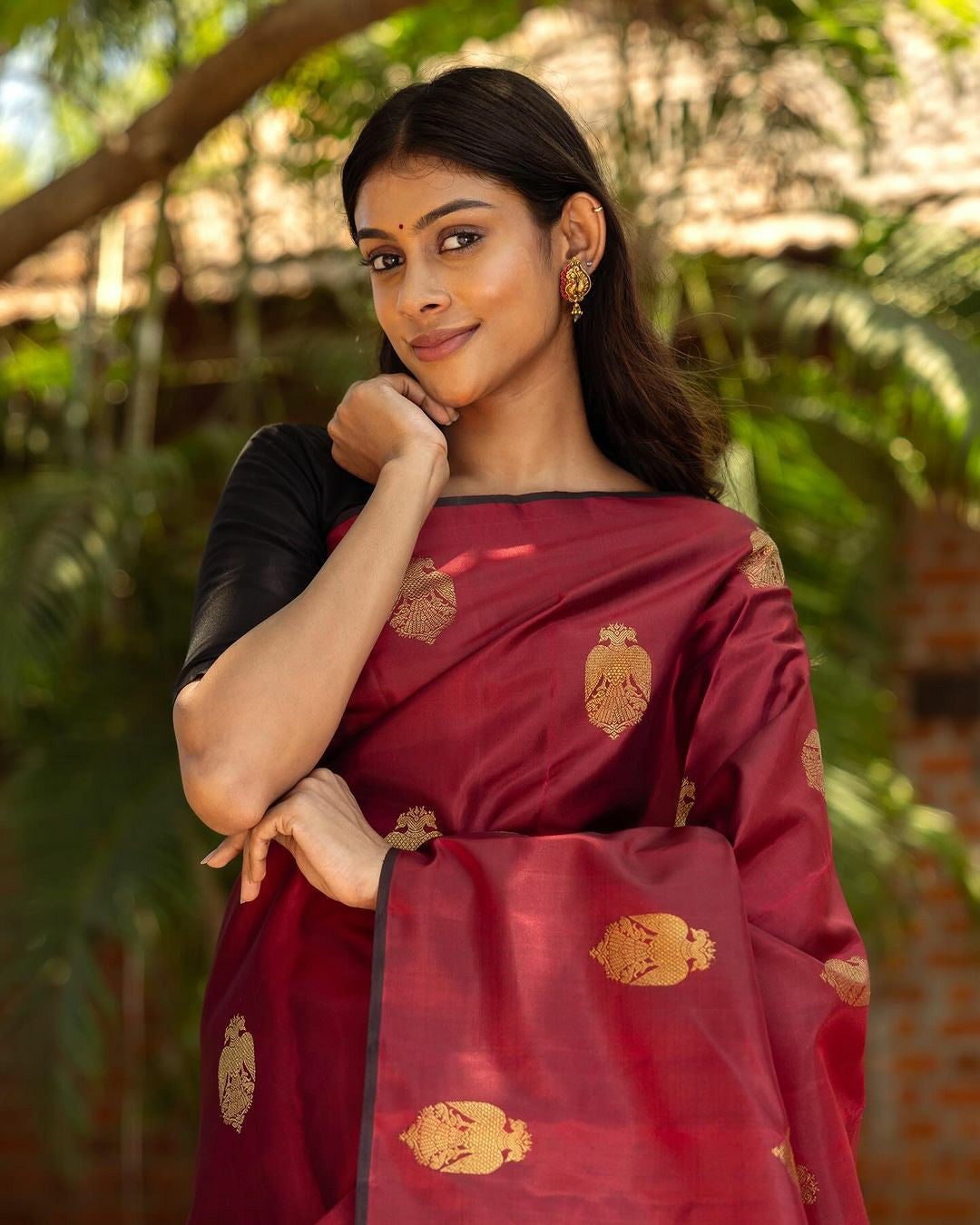 Maroon Elegance with Rich Golden Weave