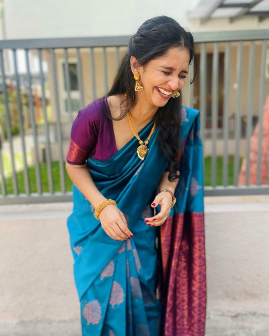 Graceful Teal Saree with Rich Purple Pallu