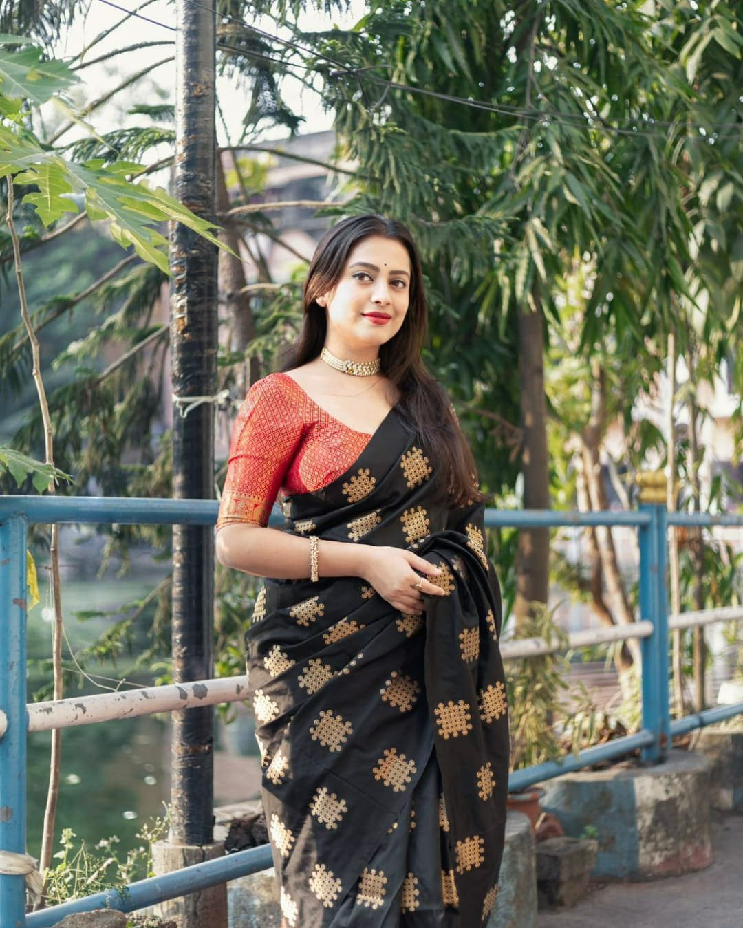 Black Banarasi-Style Saree with Gold Weaves & Peach Border
