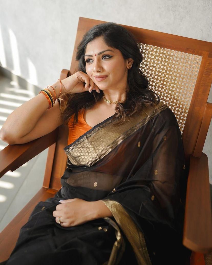 Black and Orange Silk Saree with Golden Border