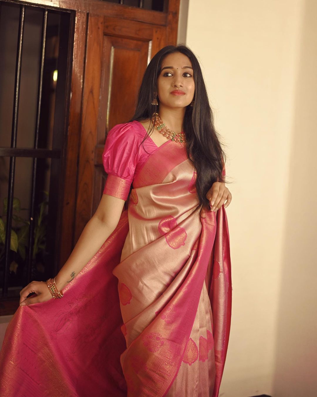 Elegant Pink & Gold Silk Saree with Traditional Motifs