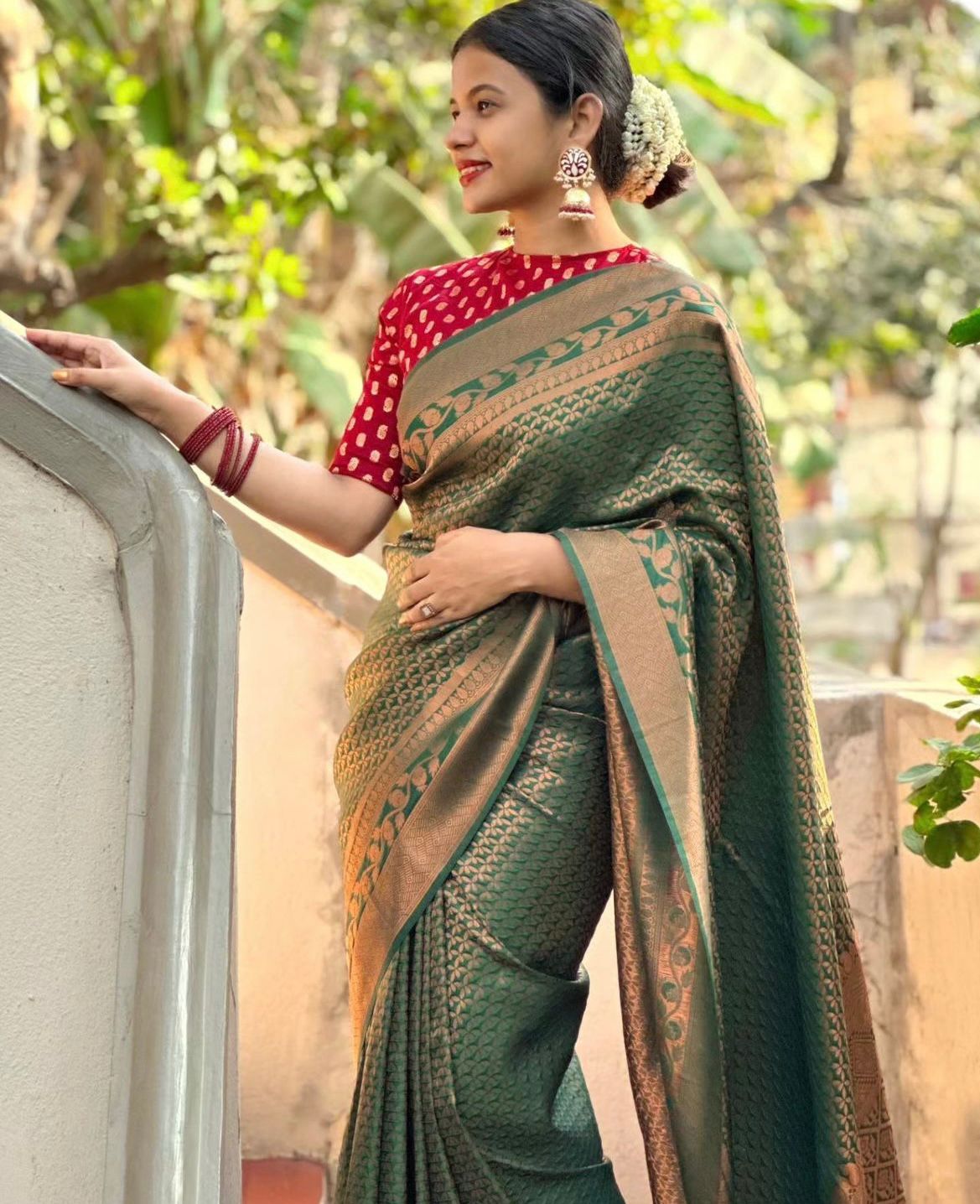 Elegant Green Silk Saree with Zari Work & Red Blouse