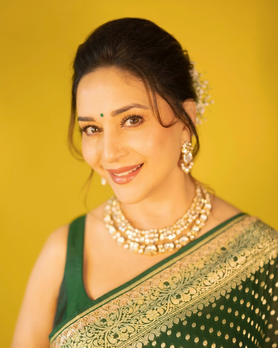 Green Silk Saree with Gold Butti & Zari Border