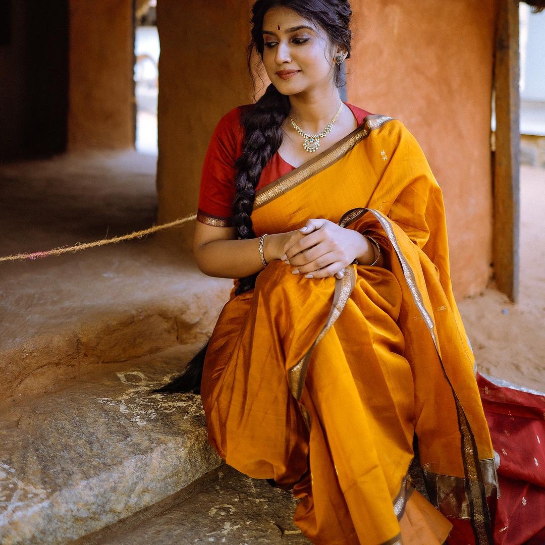 Yellow Silk Saree with Gold Border & Red Blouse