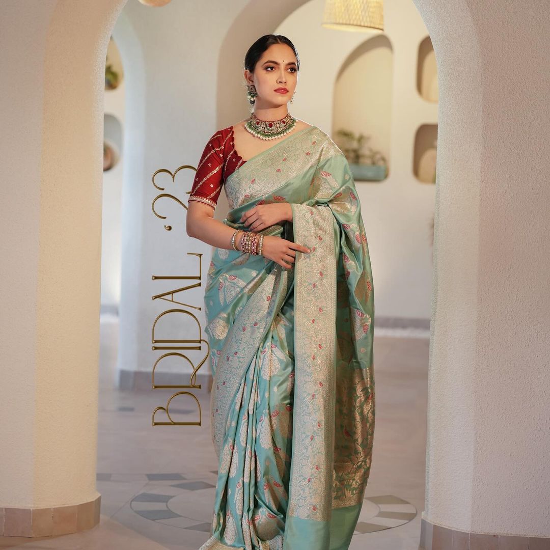 Mint Green Silk Saree with Gold Zari & Red Blouse