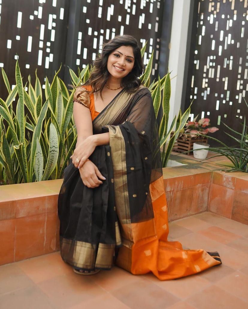 Black and Orange Silk Saree with Golden Border