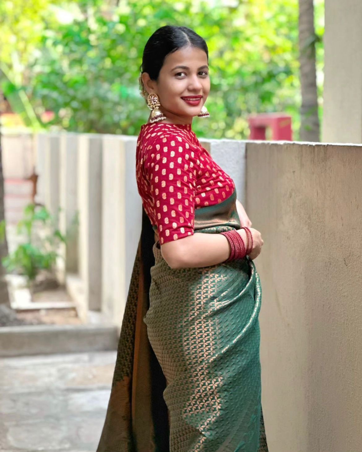 Elegant Green Silk Saree with Zari Work & Red Blouse