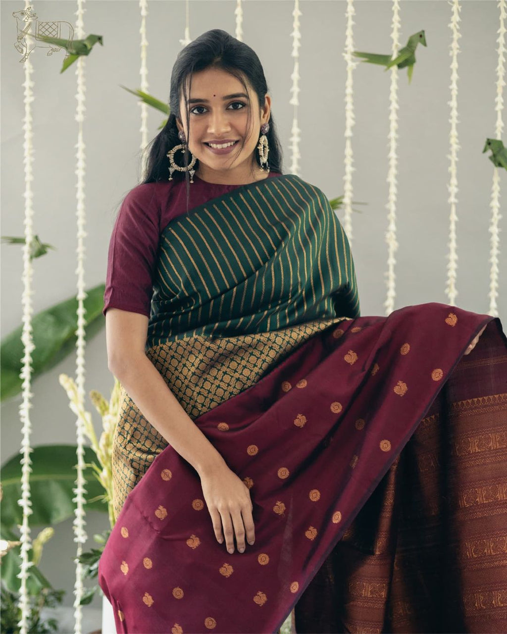 Green Silk Saree with Wine Contrast Border & Gold Zari Weaving