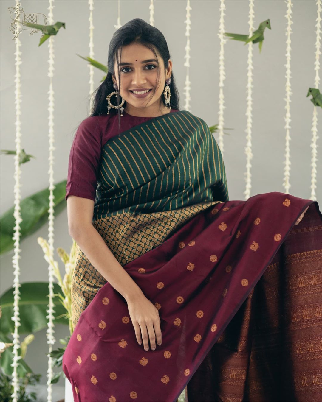 Green Silk Saree with Wine Contrast Border & Gold Zari Weaving