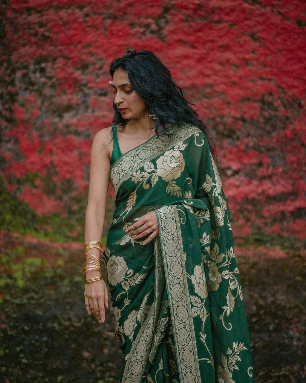 Elegant Green Silk Saree with Gold Floral Design