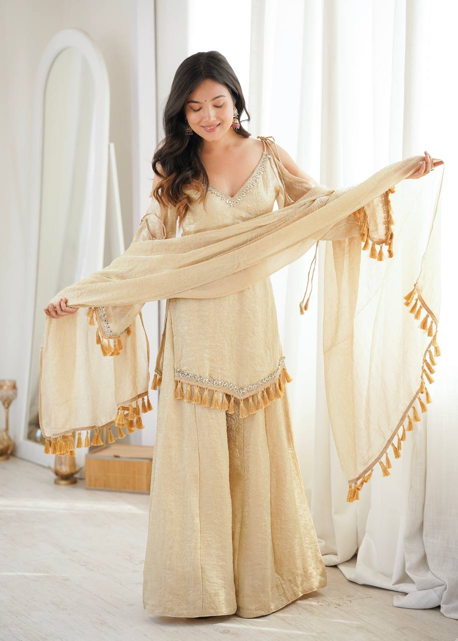 Beige Gold Tissue Silk Sharara Set with Cold-Shoulder Kurta & Tassel Dupatta
