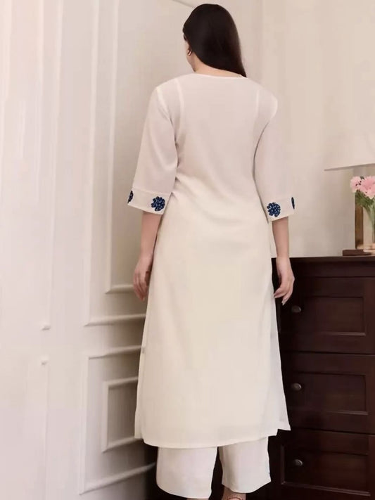 Graceful White Kurta Set with Blue Floral Accents