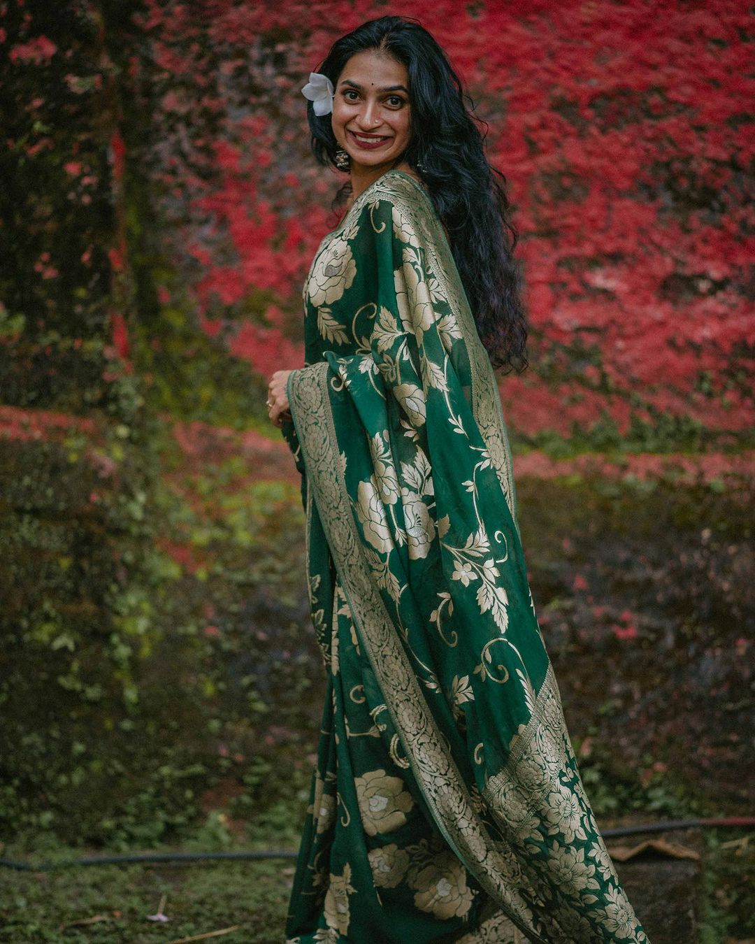 Elegant Green Silk Saree with Gold Floral Design