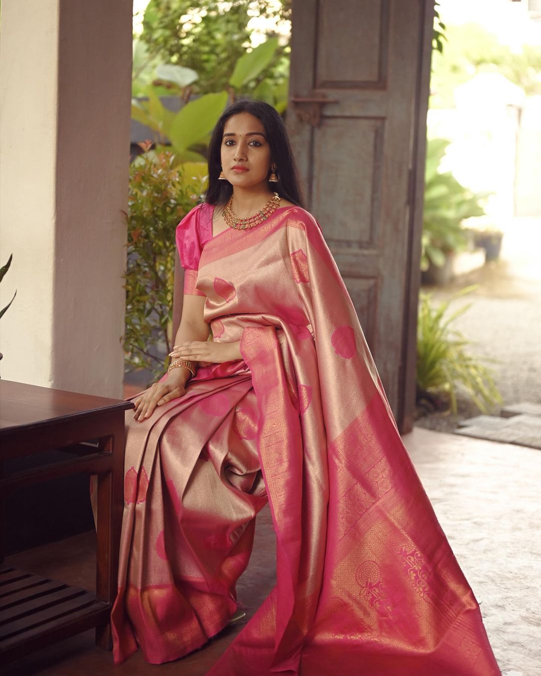 Elegant Pink & Gold Silk Saree with Traditional Motifs