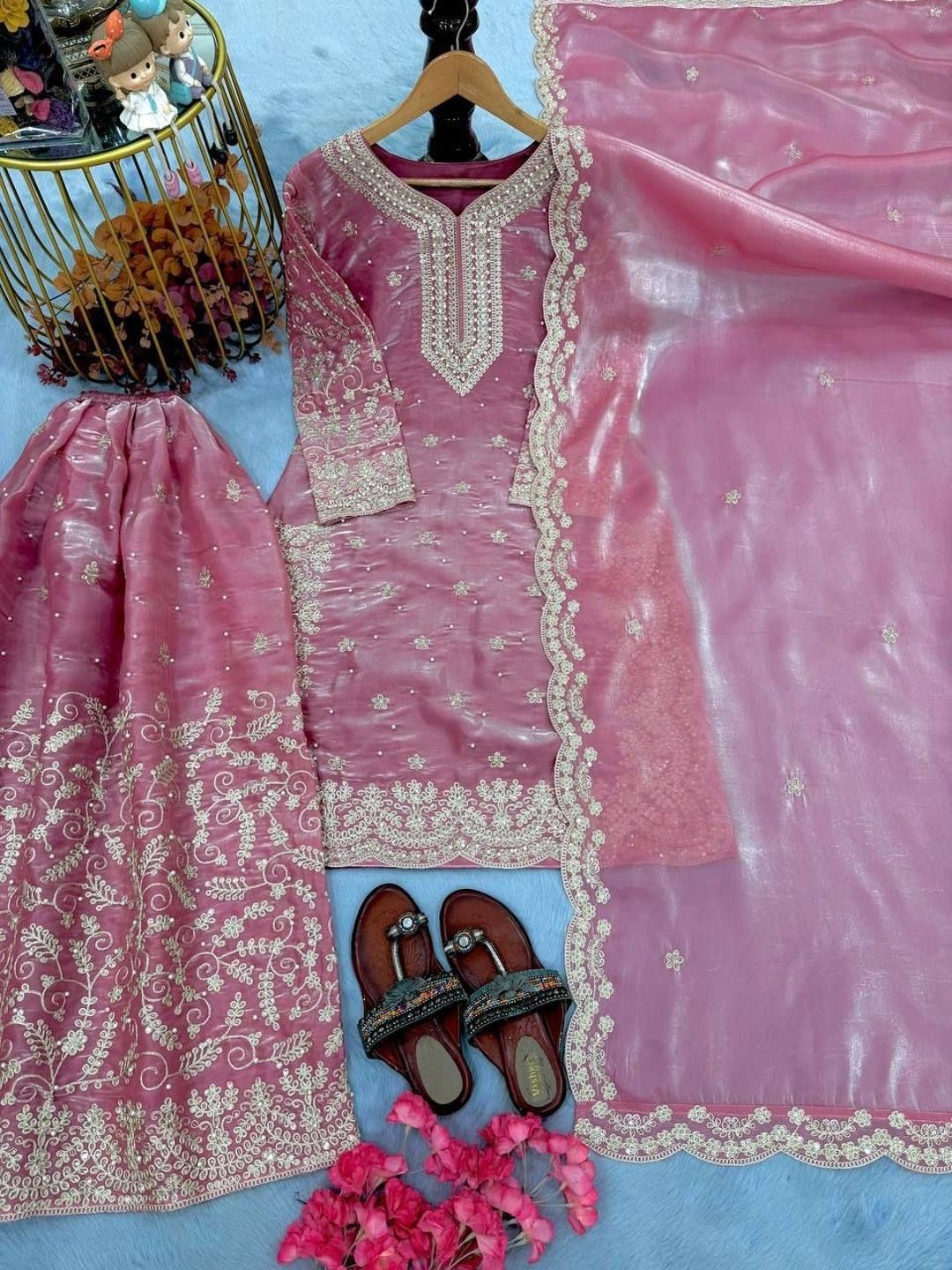 Dusty pink shimmer tissue organza kurti with heavy floral embroidered sharara pants and scalloped dupatta set for women.