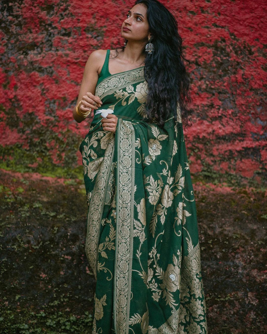 Elegant Green Silk Saree with Gold Floral Design