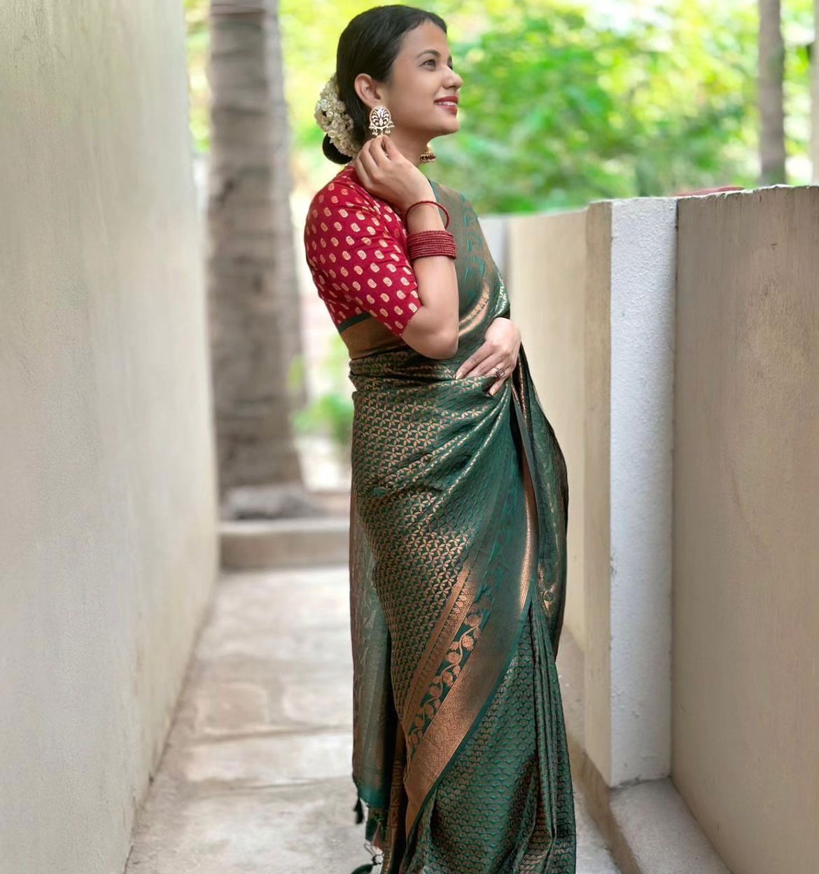 Elegant Green Silk Saree with Zari Work & Red Blouse