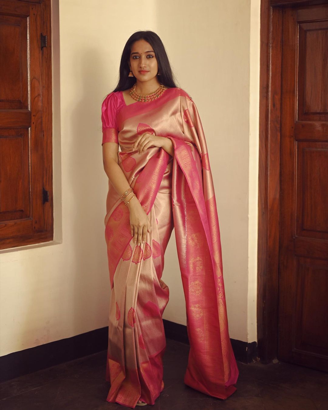 Elegant Pink & Gold Silk Saree with Traditional Motifs