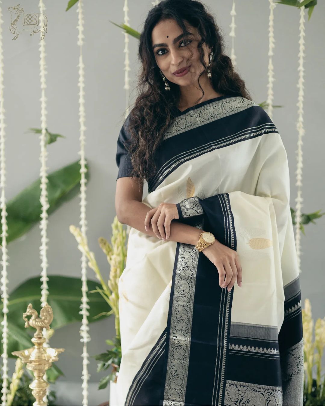Elegant White Silk Saree with Black Border & Zari Work