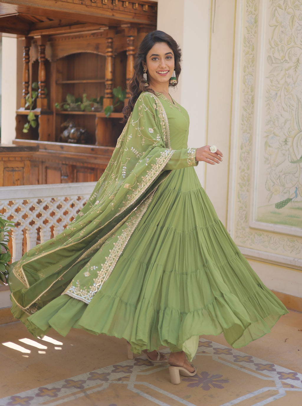 Elegant Pista Green Tiered Anarkali Gown with Gota Patti Dupatta