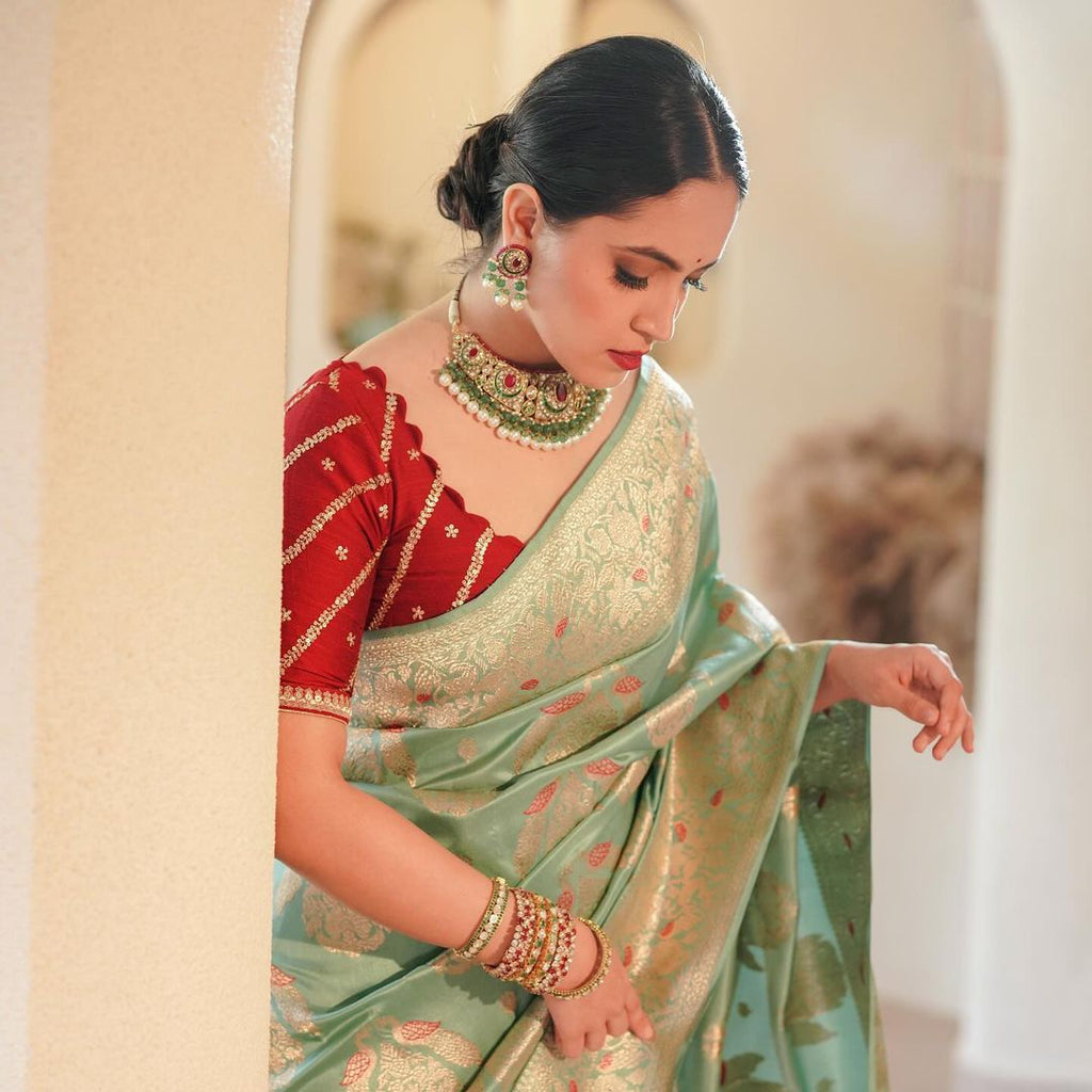 Mint Green Silk Saree with Gold Zari & Red Blouse