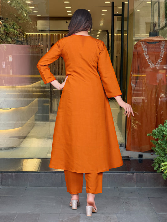 Radiant Orange Kurta Set with Chic Embellishments