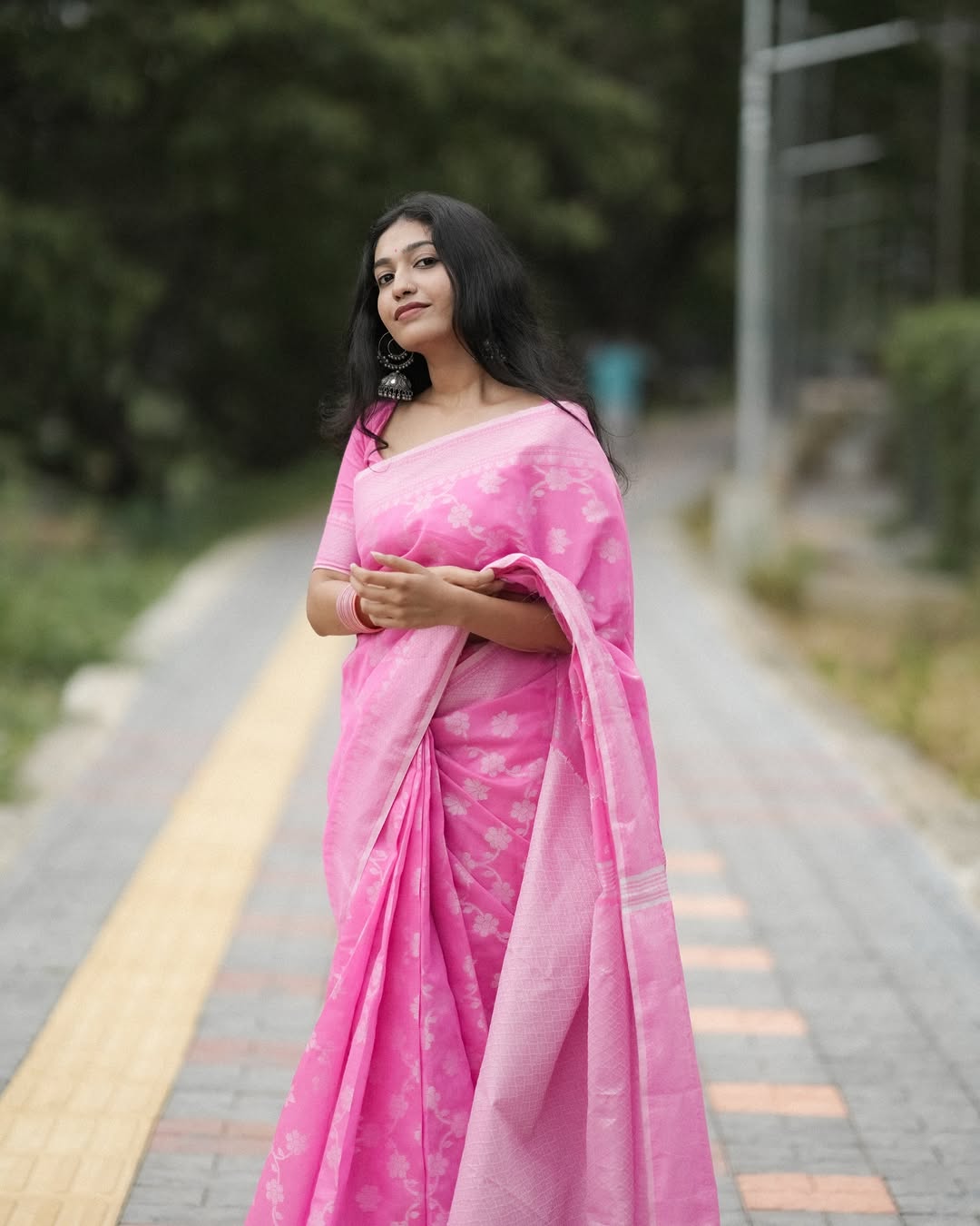 Soft Pink Linen Saree with Floral Weaving