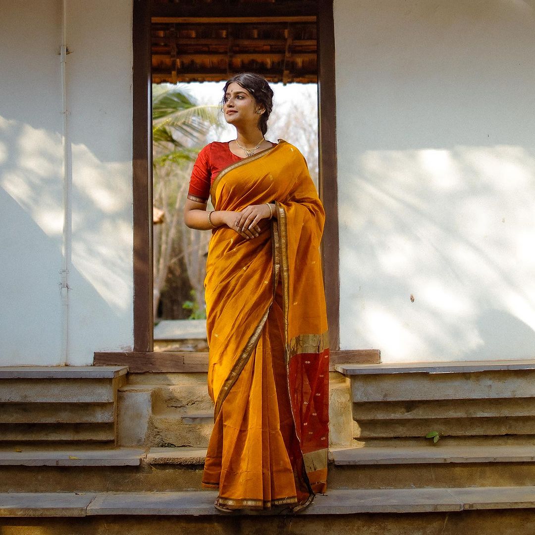 Yellow Silk Saree with Gold Border & Red Blouse