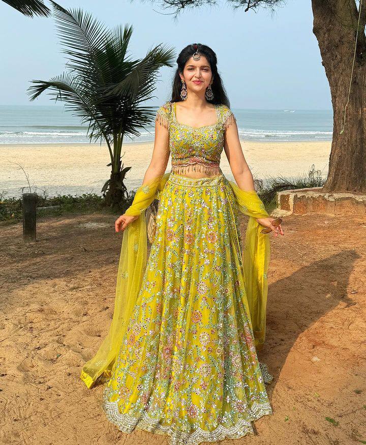 Party Wear Butterfly Net Parrot Green Lehenga Choli