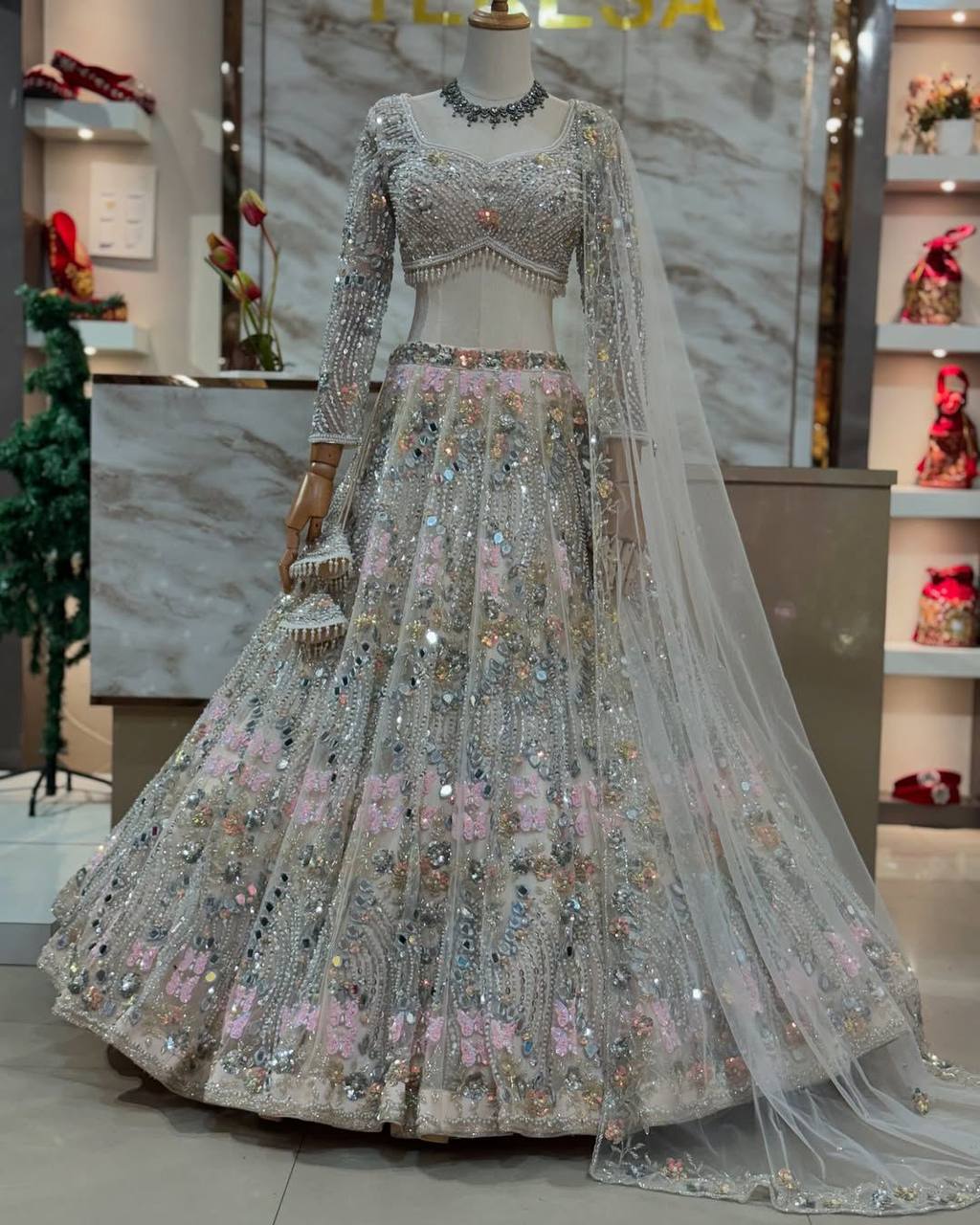 Wedding Wear Net Embroidered White Lehenga Choli