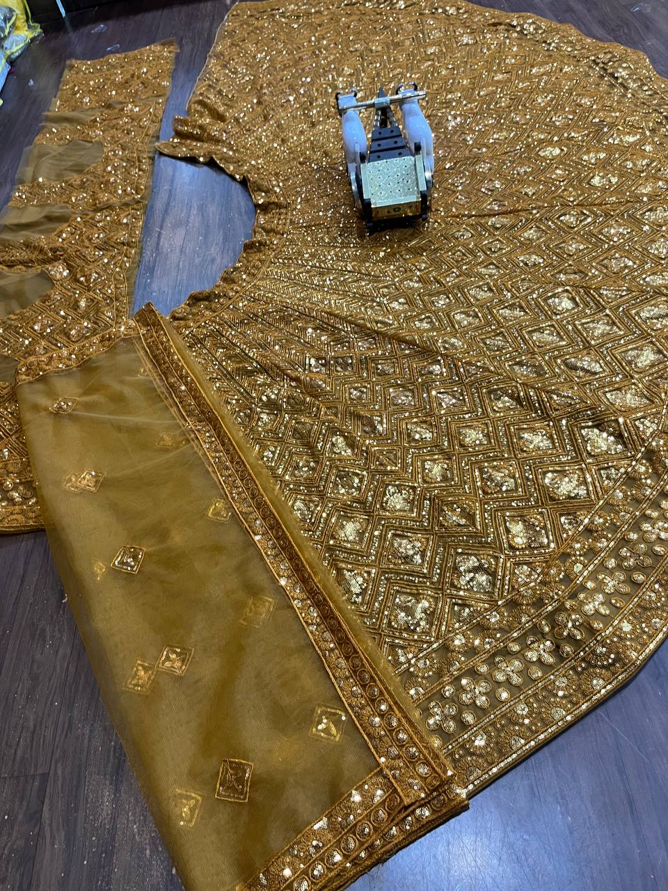 Wedding Wear Net Embroidered Yellow Lehenga Choli