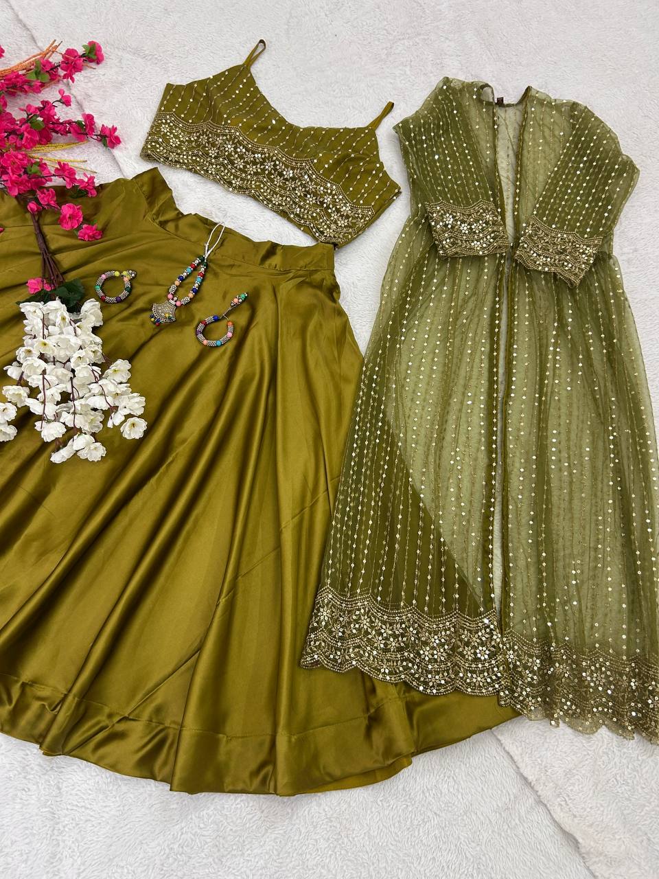 Party Wear Silk Green Lehenga Choli With Shrug